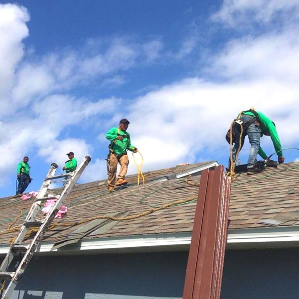 roofing crew working on a residential roof