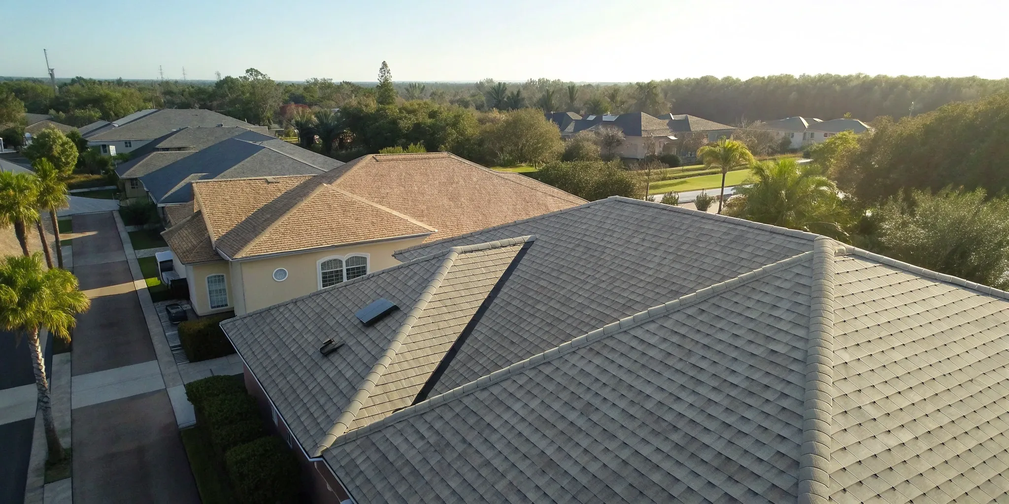 Aerial view of Florida homes, where roof size and material are major factors in replacement cost.