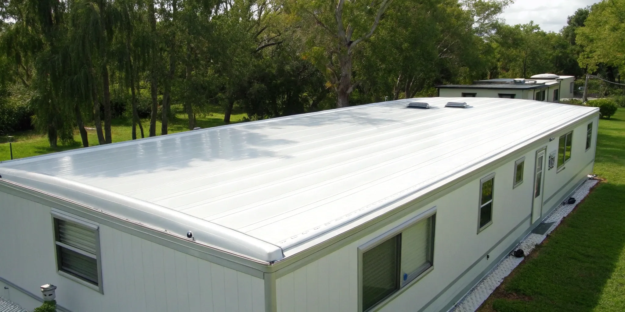 White TPO roofing installed on a mobile home, showing properly welded seams.